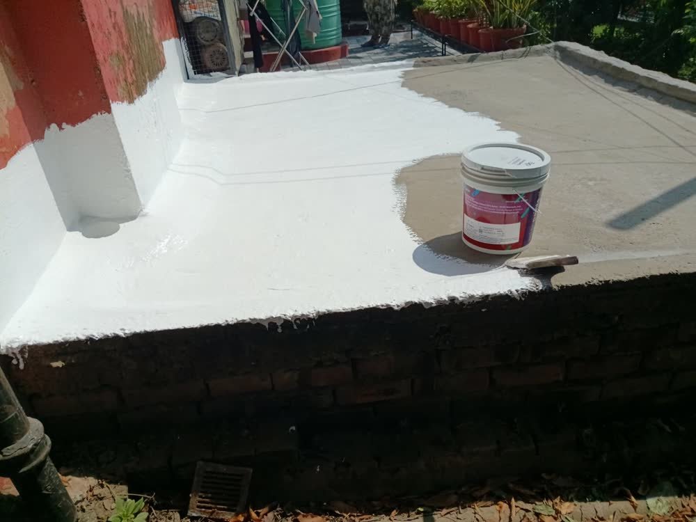 Real terrace waterproofing with Dr. Fixit coating bucket and brush by Sarfaraz Ahmad in Chandigarh