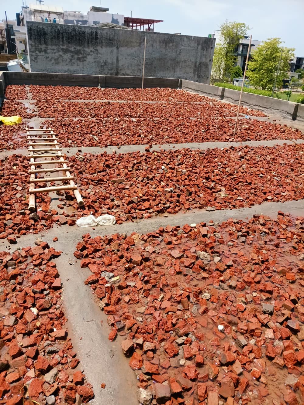 Real brick bat koba barik koba chhat rooftop insulation and waterproofing by Sarfaraz Ahmad in Chandigarh